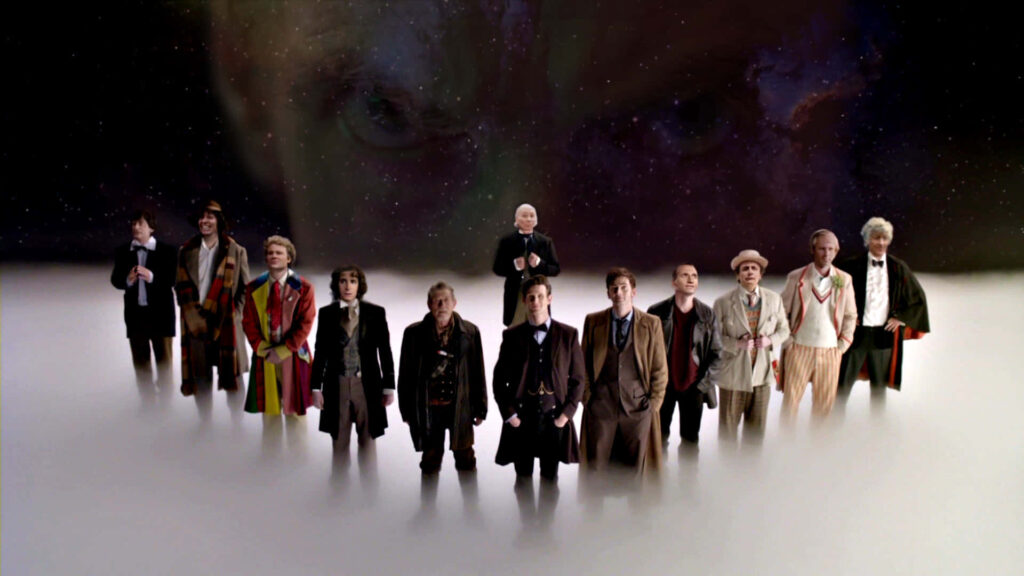 Iconic Doctor Who Doctors Wallpaper: Cosmic Cloud Background