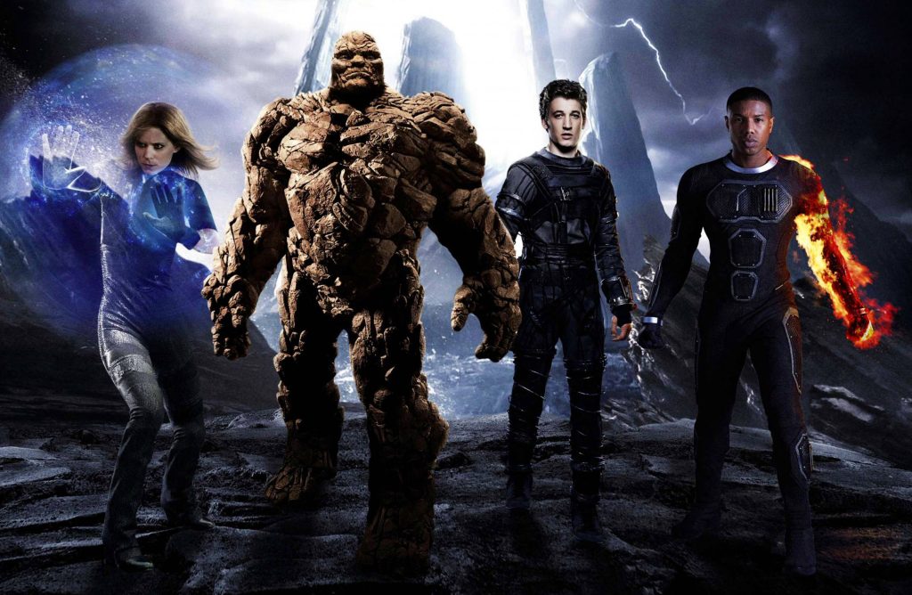 Fantastic Four 2015 superheroes on alien world with Sue Storm force field Johnny fiery arm lightning Wallpaper