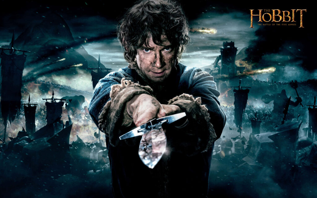 Dynamic The Hobbit Hero Wallpaper: Battle-Ready Sword & Chaos
