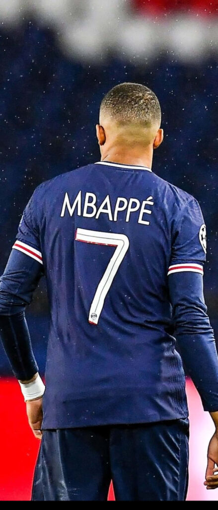 Kylian Mbappe Action Wallpaper - Iconic Number 7 Jersey
