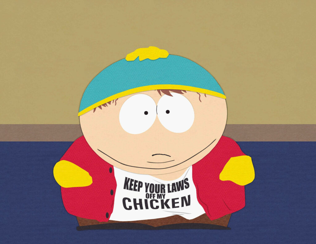 Eric Cartman in classic outfit wearing Keep Your Laws Off My Chicken shirt cartoon wallpaper