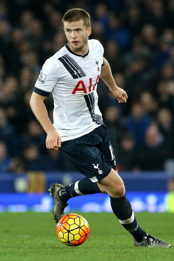 Eric Dier in Tottenham Hotspur kit in action during Premier League match with vibrant stadium background Wallpaper