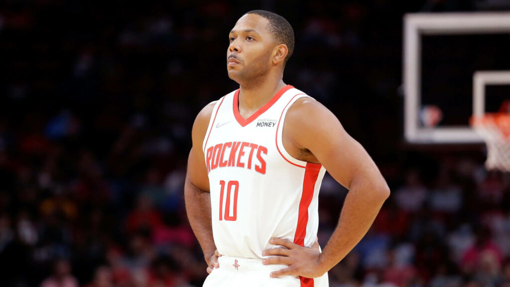 Eric Gordon Houston Rockets basketball player in red uniform focused on court action wallpaper