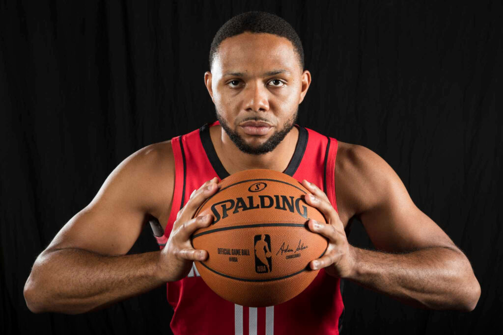 Eric Gordon intense basketball portrait black background Spalding NBA uniform sports wallpaper