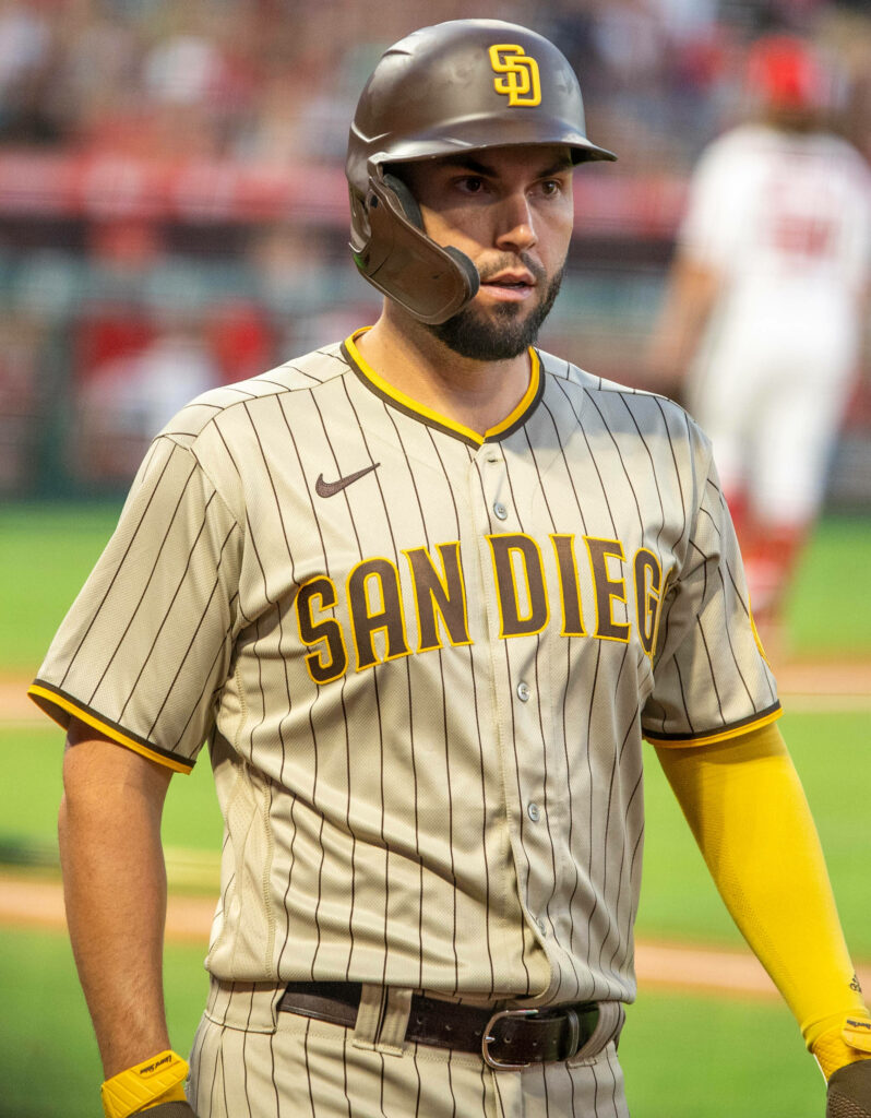 Eric Hosmer in brown pinstripe San Diego Padres uniform with focused intense baseball field look Wallpaper