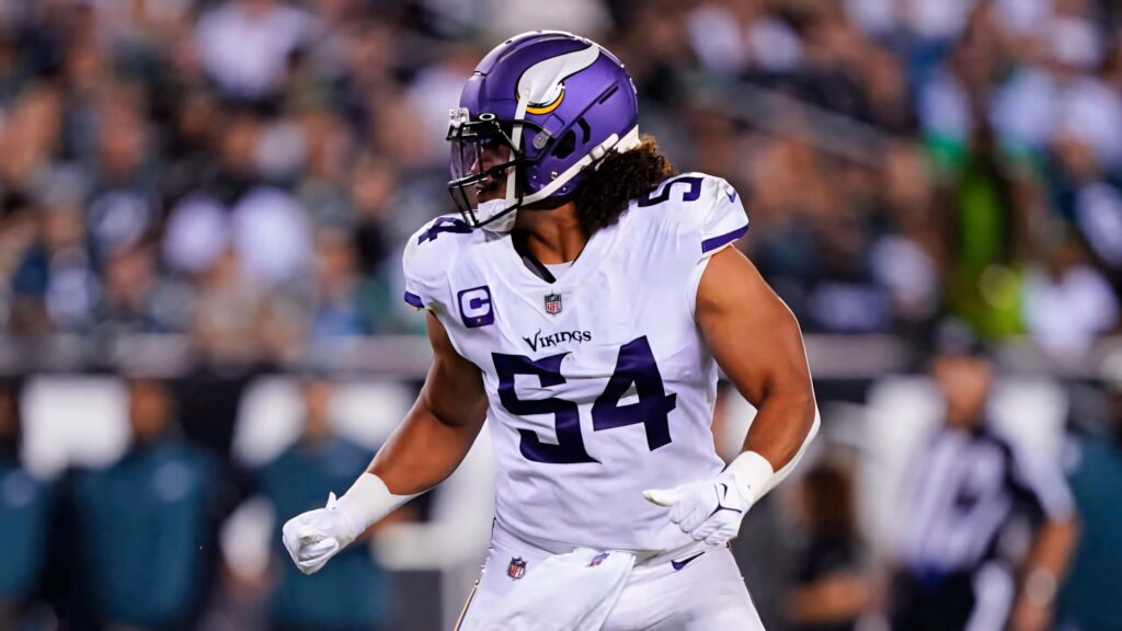 Eric Kendricks Minnesota Vikings linebacker mid-play in white purple uniform intense focus wallpaper