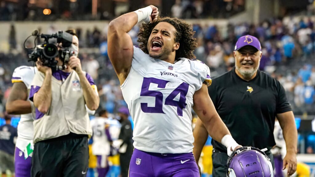 Eric Kendricks Minnesota Vikings number 54 celebrating on field vibrant football game wallpaper