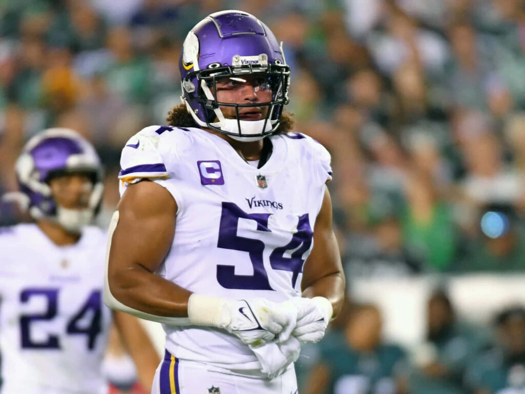Eric Kendricks in Minnesota Vikings uniform shows intense focus and athletic build on field Wallpaper