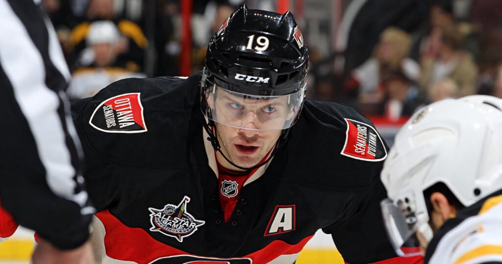 Erik Karlsson Ottawa Senators faceoff intense focus black red white uniform hockey wallpaper