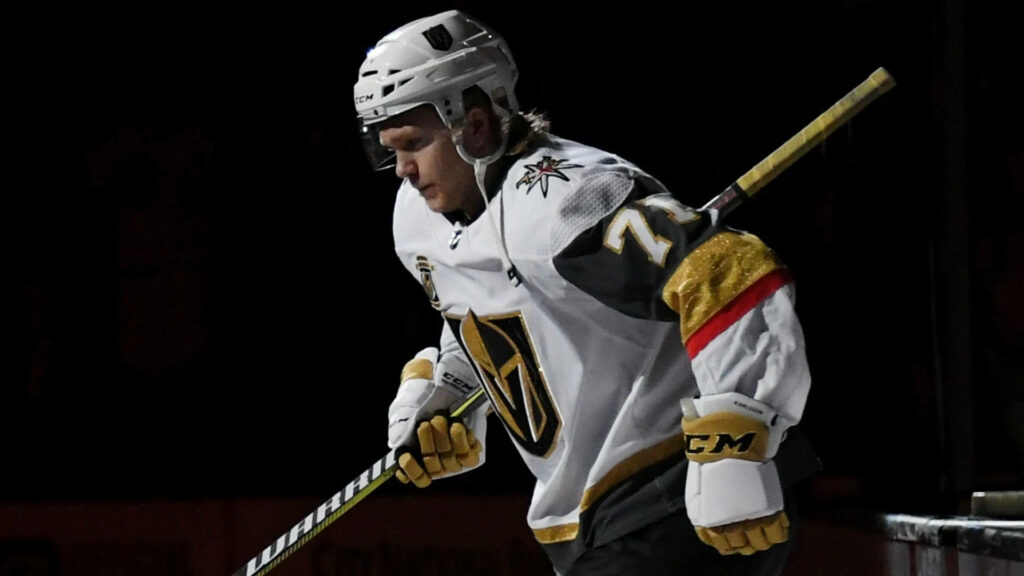Erik Karlsson Vegas Golden Knights wallpaper intense expression bold gold black white colors
