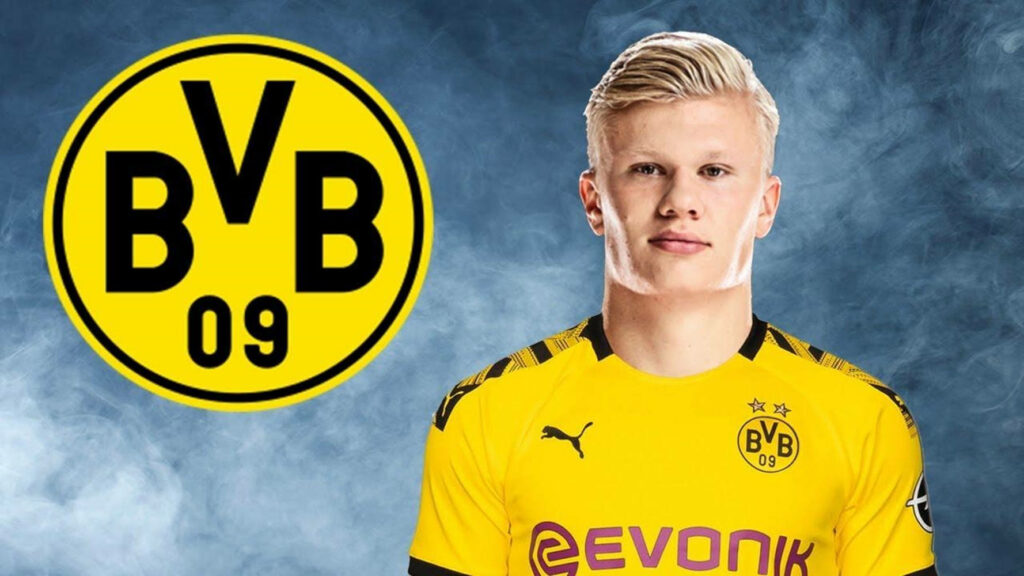 Dynamic Erling Haaland BVB Wallpaper: Yellow Jersey with Emblem
