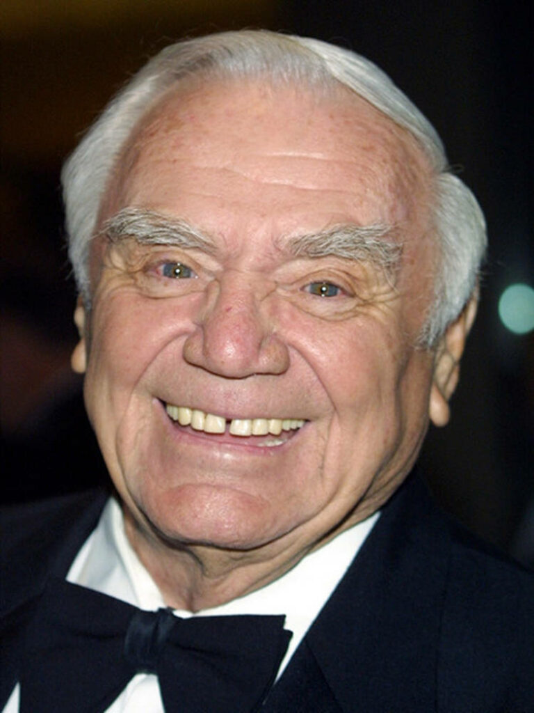 Ernest Borgnine portrait smiling in black tuxedo with white hair vibrant high resolution wallpaper