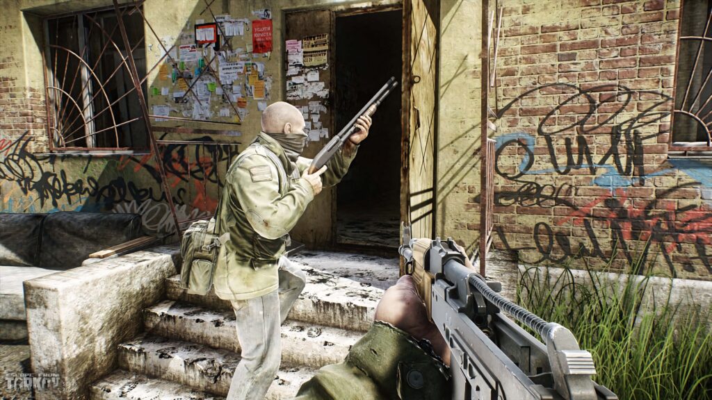Escape from Tarkov wallpaper showing two armed characters in a graffiti-covered urban building