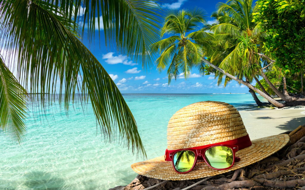 Paradise Getaways: Exploring Tropical Islands on a sunlit Coastal Retreat Wallpaper