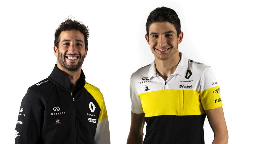Esteban Ocon and Daniel Ricciardo smiling in Renault team gear vibrant wallpaper with yellow black colors