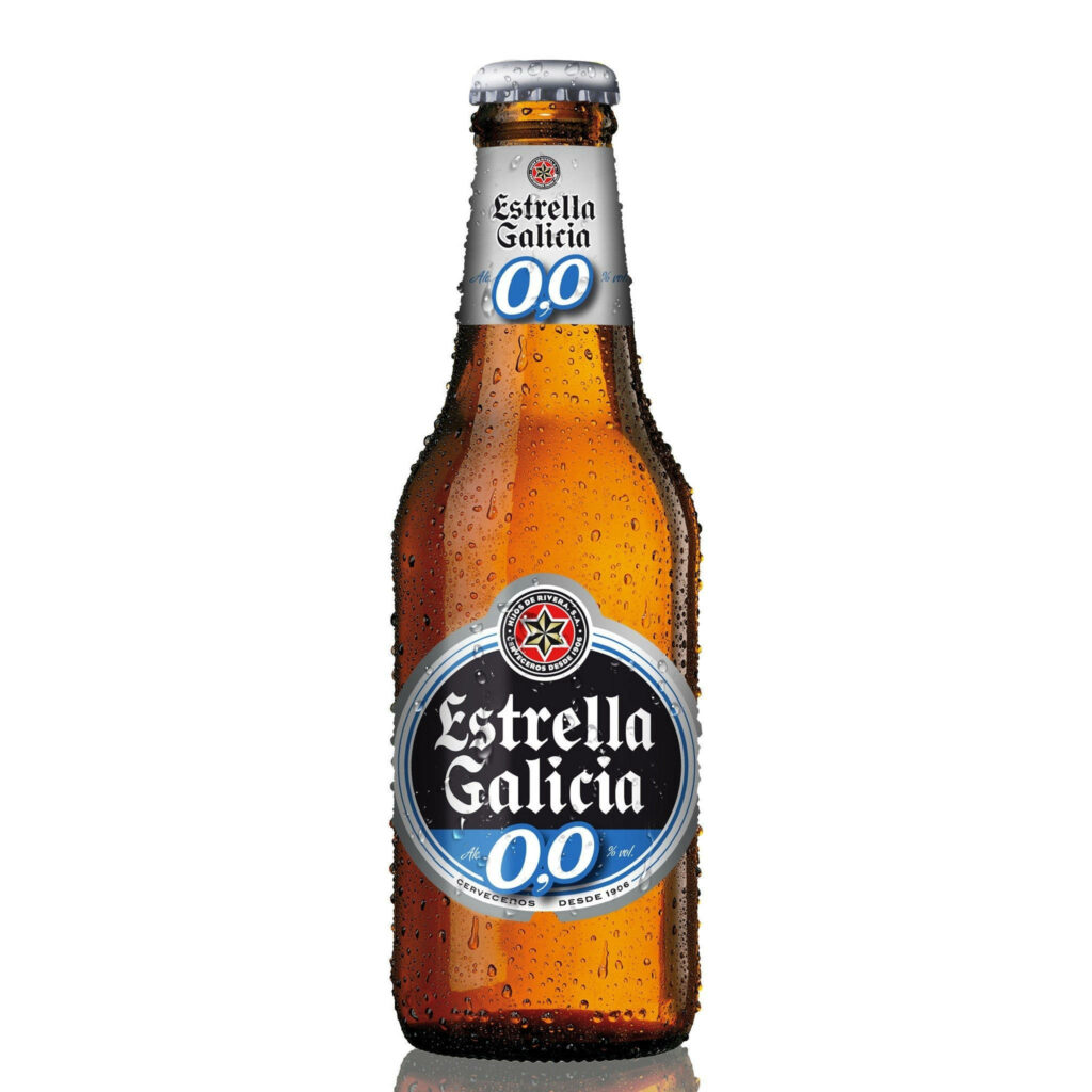 Estrella Galicia 00 zero alcohol beer bottle with condensation on amber glass and blue silver label Wallpaper