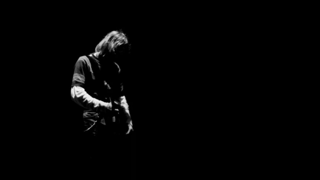 Vibrant Tribute to Kurt Cobain: Captivating HD Wallpaper of Nirvana's Unforgettable Frontman