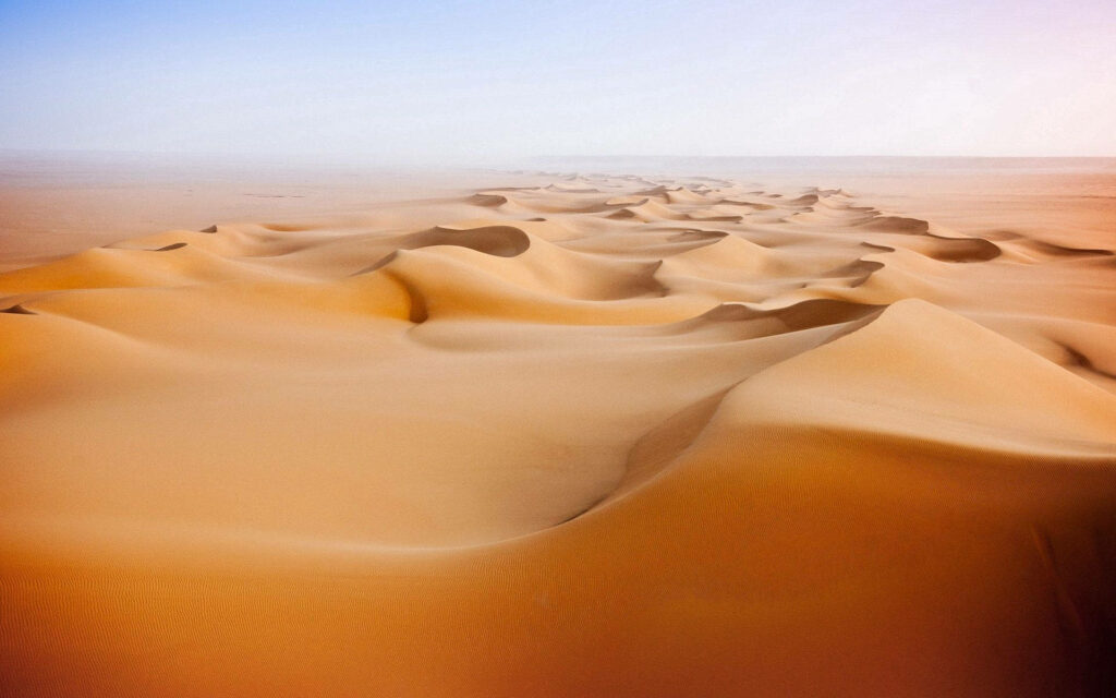 Endless Beauty: Mesmerizing Desert Landscape at Sunset Wallpaper