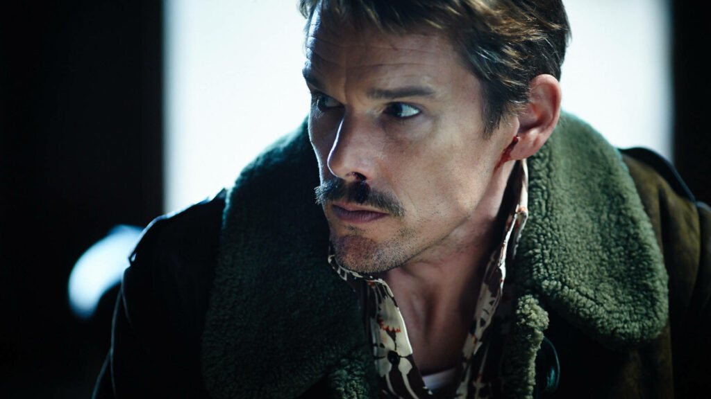 Ethan Hawke close-up wearing rugged green shearling jacket and patterned shirt cinematic style Wallpaper
