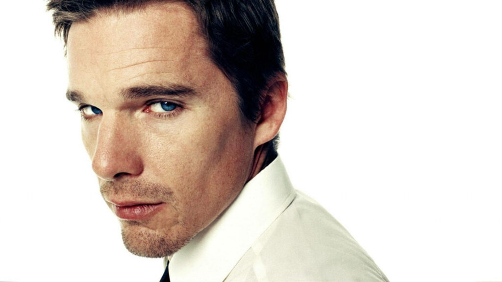 Ethan Hawke close-up portrait in classic suit intense gaze white background Hollywood celebrity wallpaper