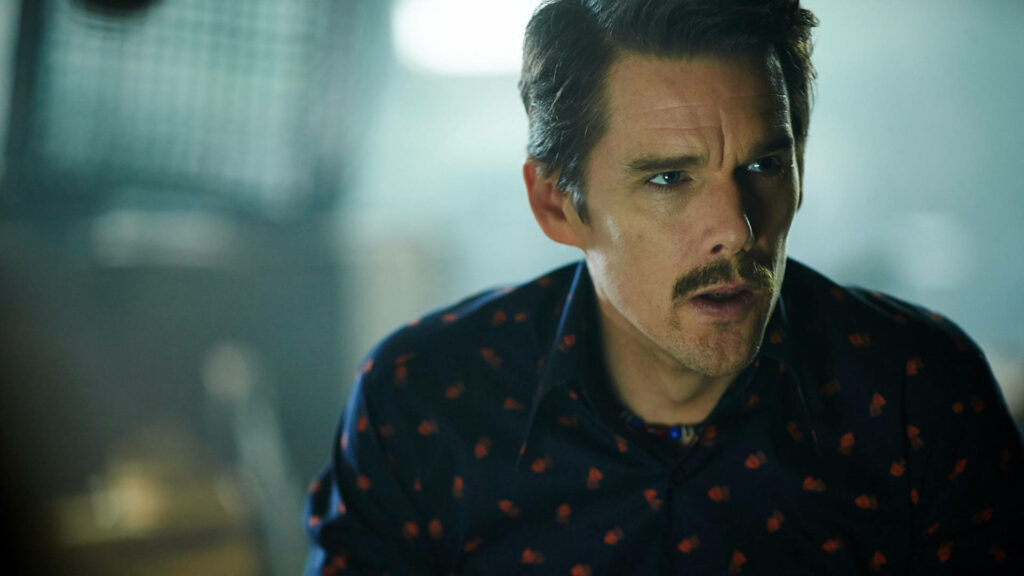 Ethan Hawke close-up Hollywood action star wallpaper intense focused expression cinematic lighting