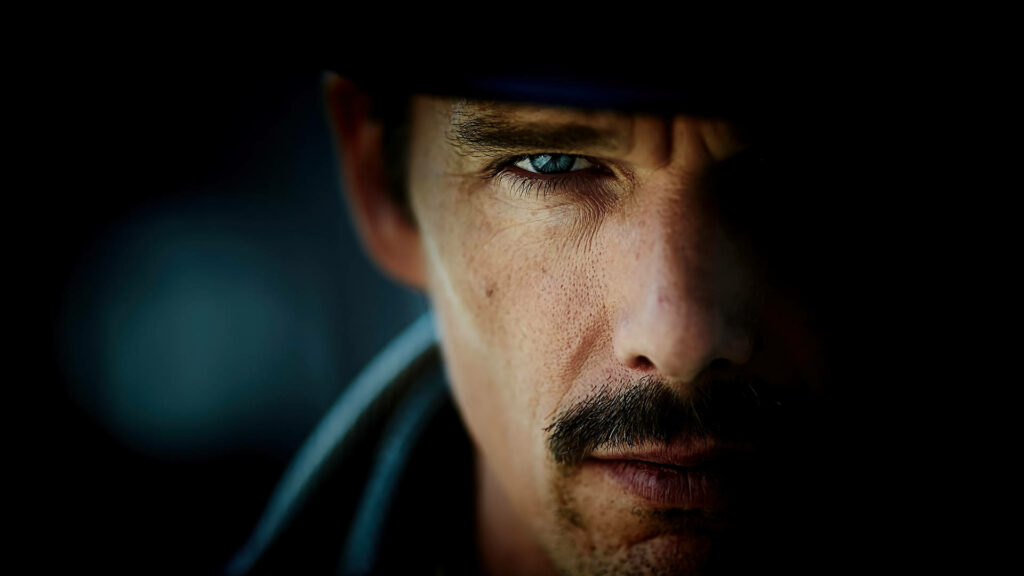 Ethan Hawke intense blue eyes mustache thriller scene from Predestination movie dramatic lighting Wallpaper
