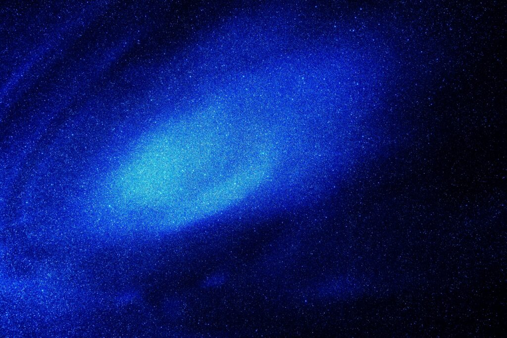 Ethereal Blue Nebula Wallpaper - Captivating Cosmic Background