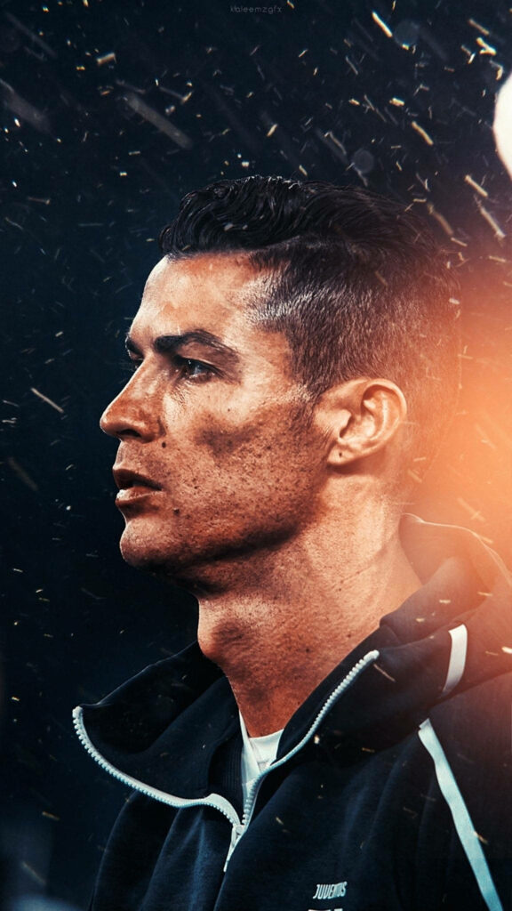 The Divine Aesthetics of CR7: Behold His Majestic Side Profile with Sharp Jawline on a Radiant Background Wallpaper