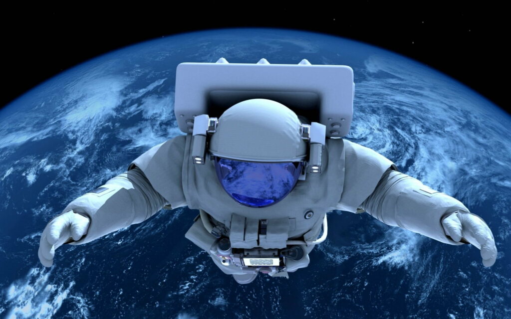 Gazing at Earth's Splendor: Majestic Astronaut in Space Suit Admiring HD Wallpaper Background