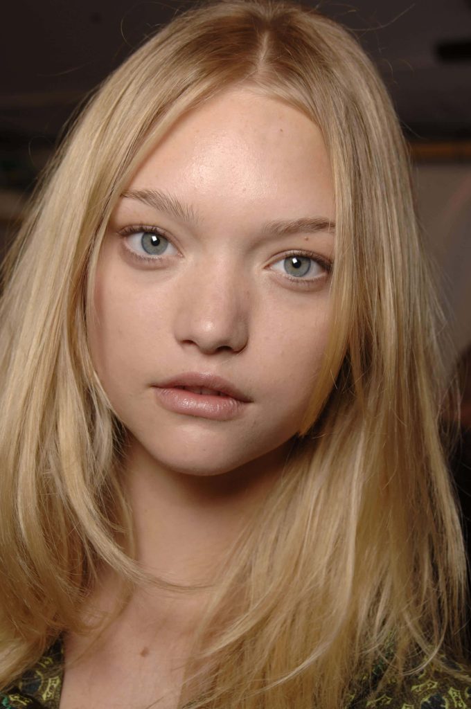 Close-up portrait of supermodel Gemma Ward with wide eyes and natural blonde hair in soft light Wallpaper