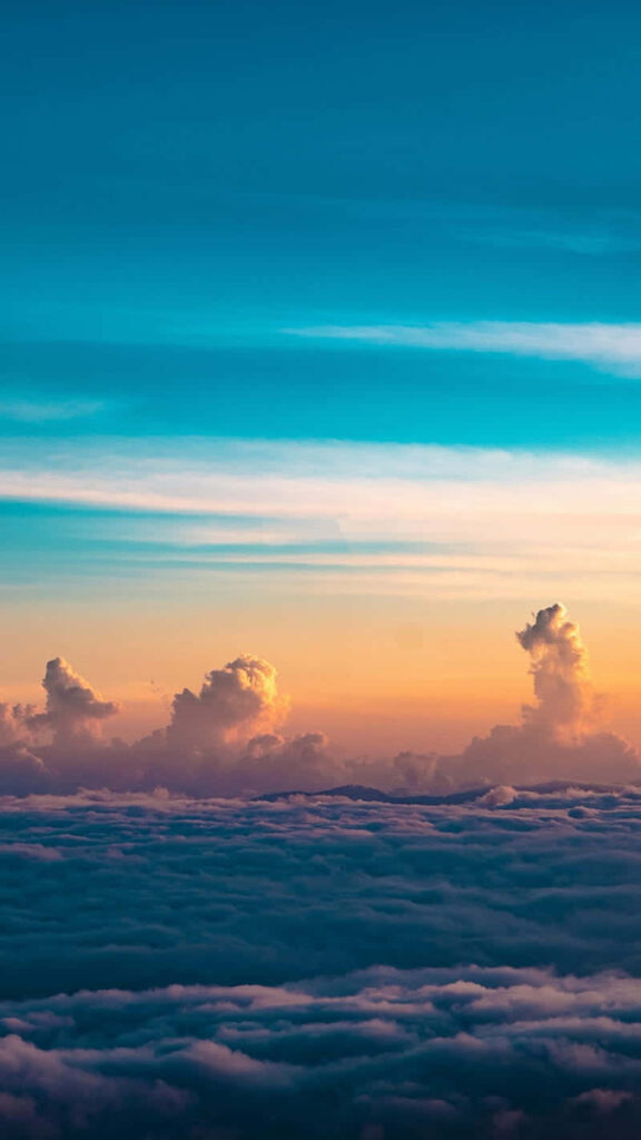 Radiant Skies: A Mesmerizing Display of Illuminated Clouds Wallpaper
