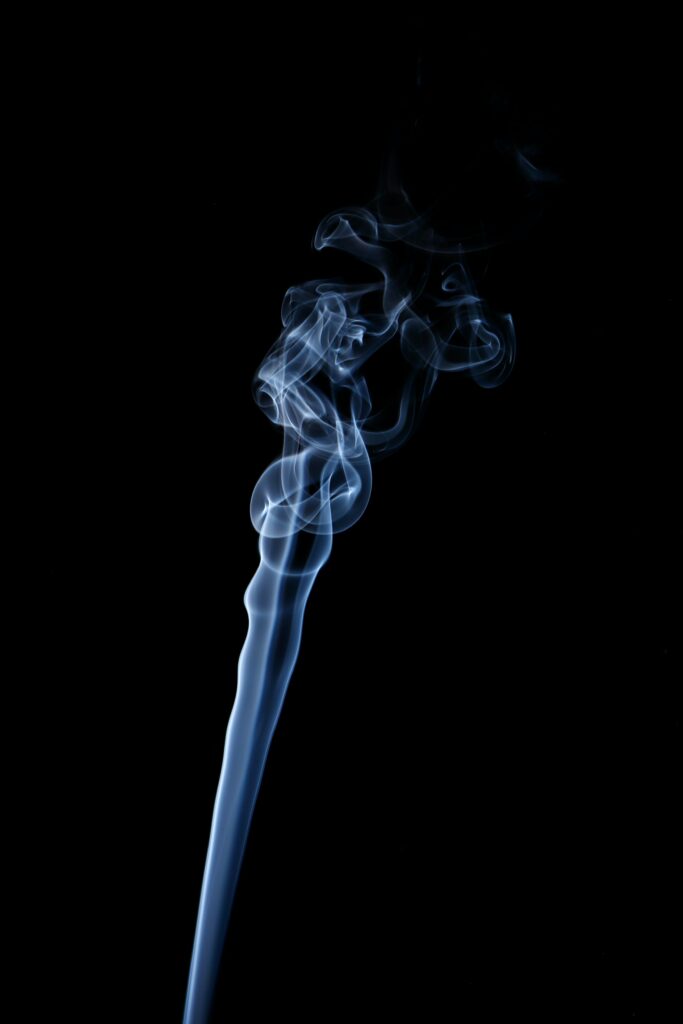 Ethereal Smoke Wallpaper: Captivating Black Background Design