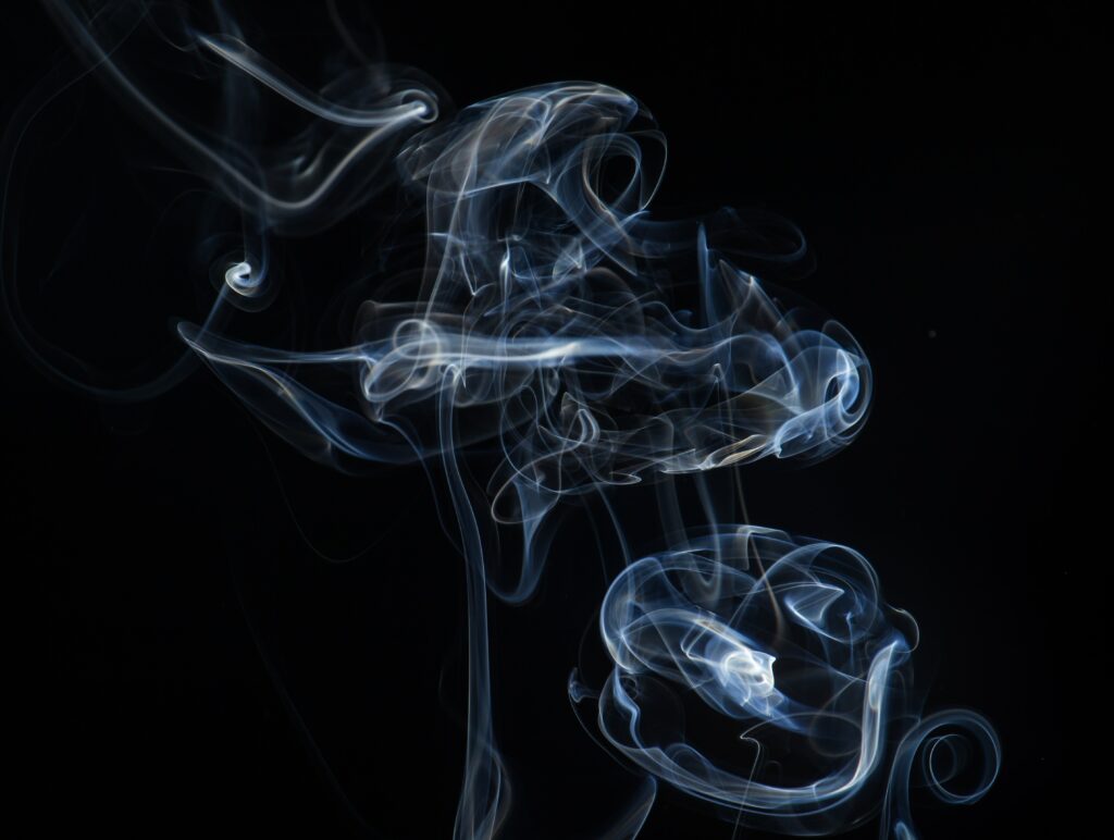 Ethereal Smoke Wallpaper: Intricate Patterns on Dark Background