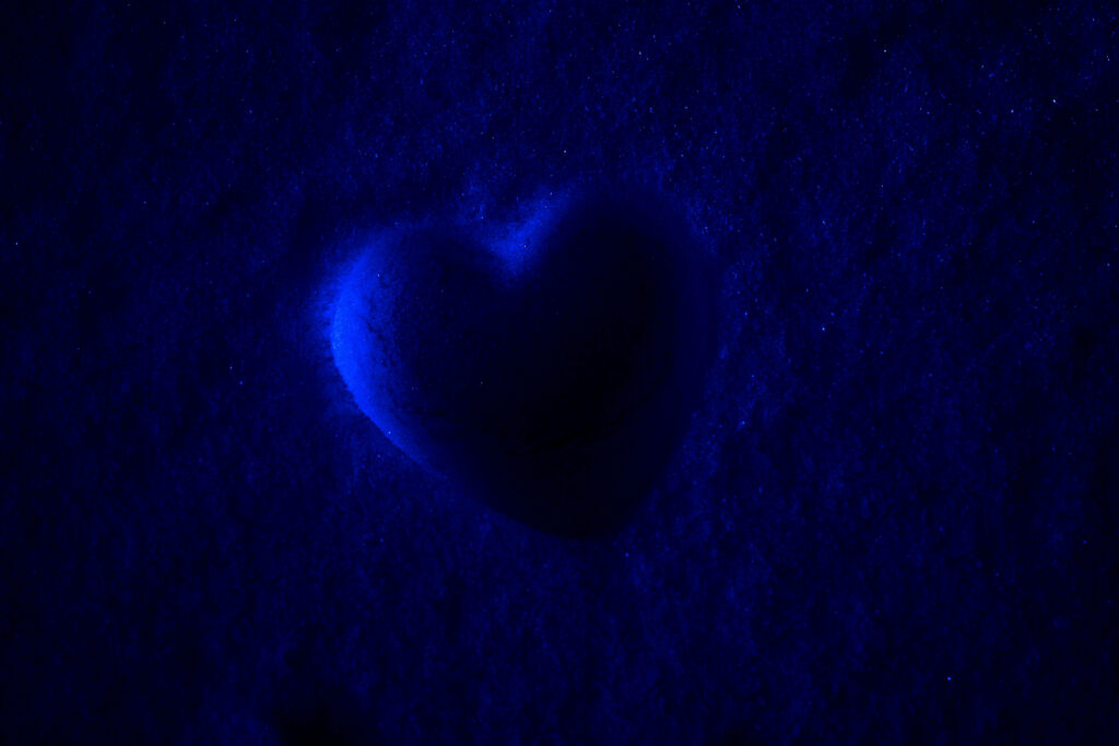 Solitary Symbol: Love's Luminescent Embrace in the Midnight Sky - Big Blue Heart Shape Wallpaper