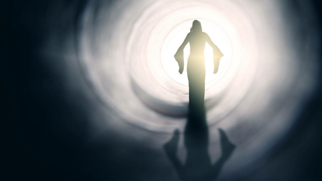 Ethereal Woman Silhouette in Dark Vortex - Mysterious Wallpaper