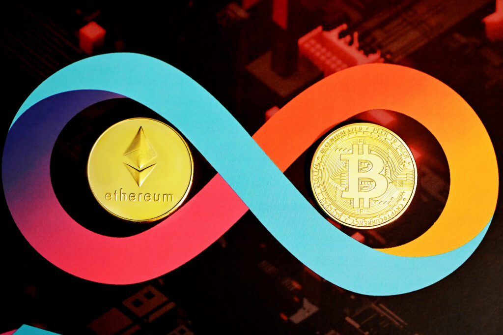 Ethereum and Bitcoin coins inside vibrant infinity sign symbolizing endless cryptocurrency potential Wallpaper