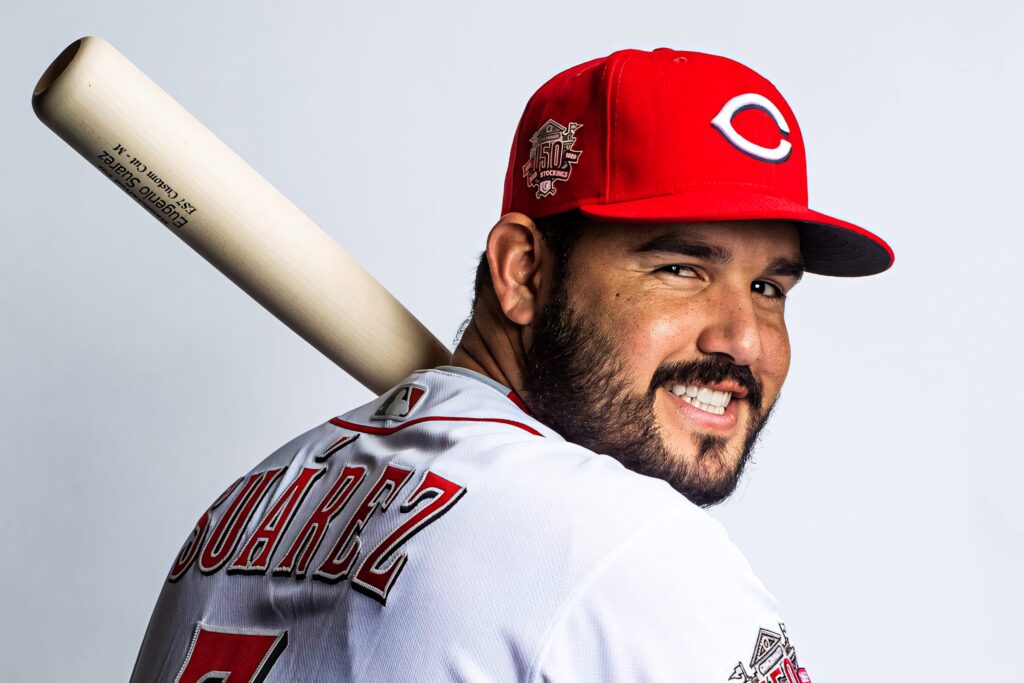 Eugenio Suárez Cincinnati Reds baseball player confident pose bat on shoulder white background Wallpaper