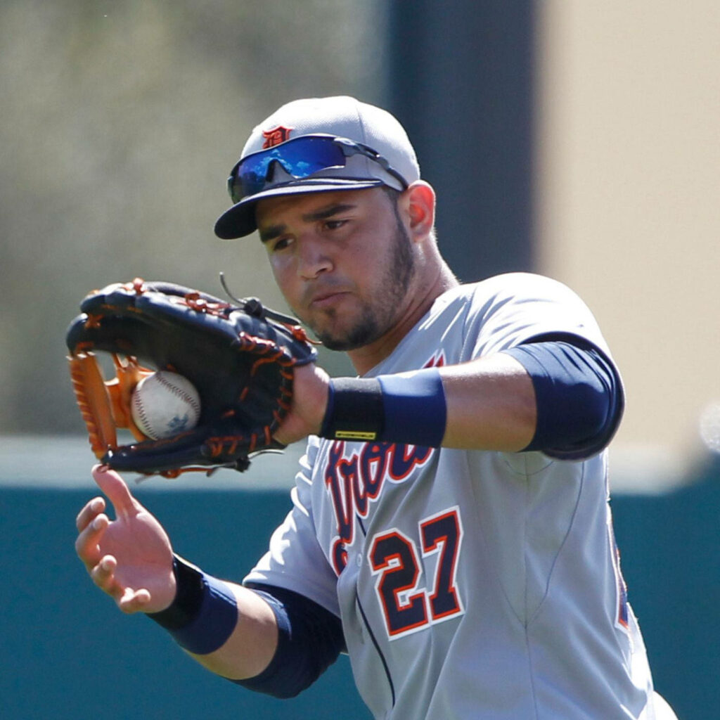 Eugenio Suárez Detroit Tigers catching ball dynamic baseball action vibrant wallpaper