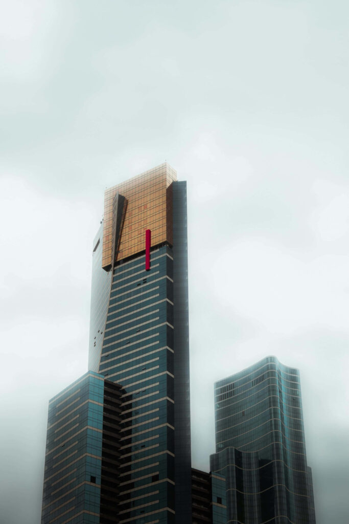 Eureka Tower Melbourne gold crown bold geometric lines misty sky modern skyscraper wallpaper