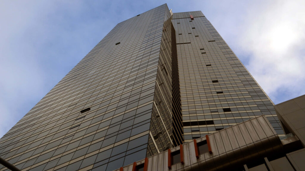 Eureka Tower Melbourne sleek modern glass steel architecture against clear blue sky wallpaper