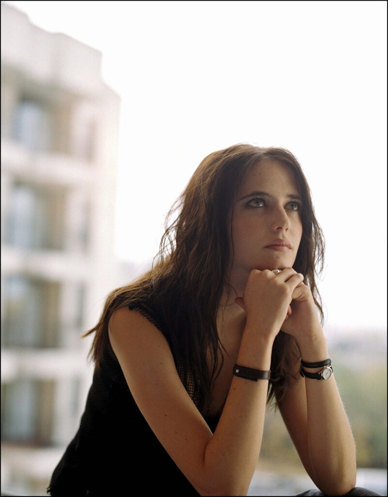 Eva Green elegant portrait thoughtful expression beautifully lit wallpaper background seamless