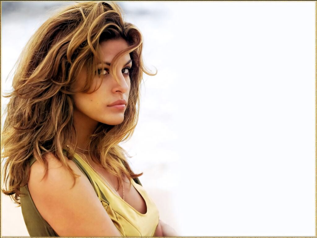 Eva Mendes thoughtful portrait with soft natural lighting elegant introspective wallpaper background