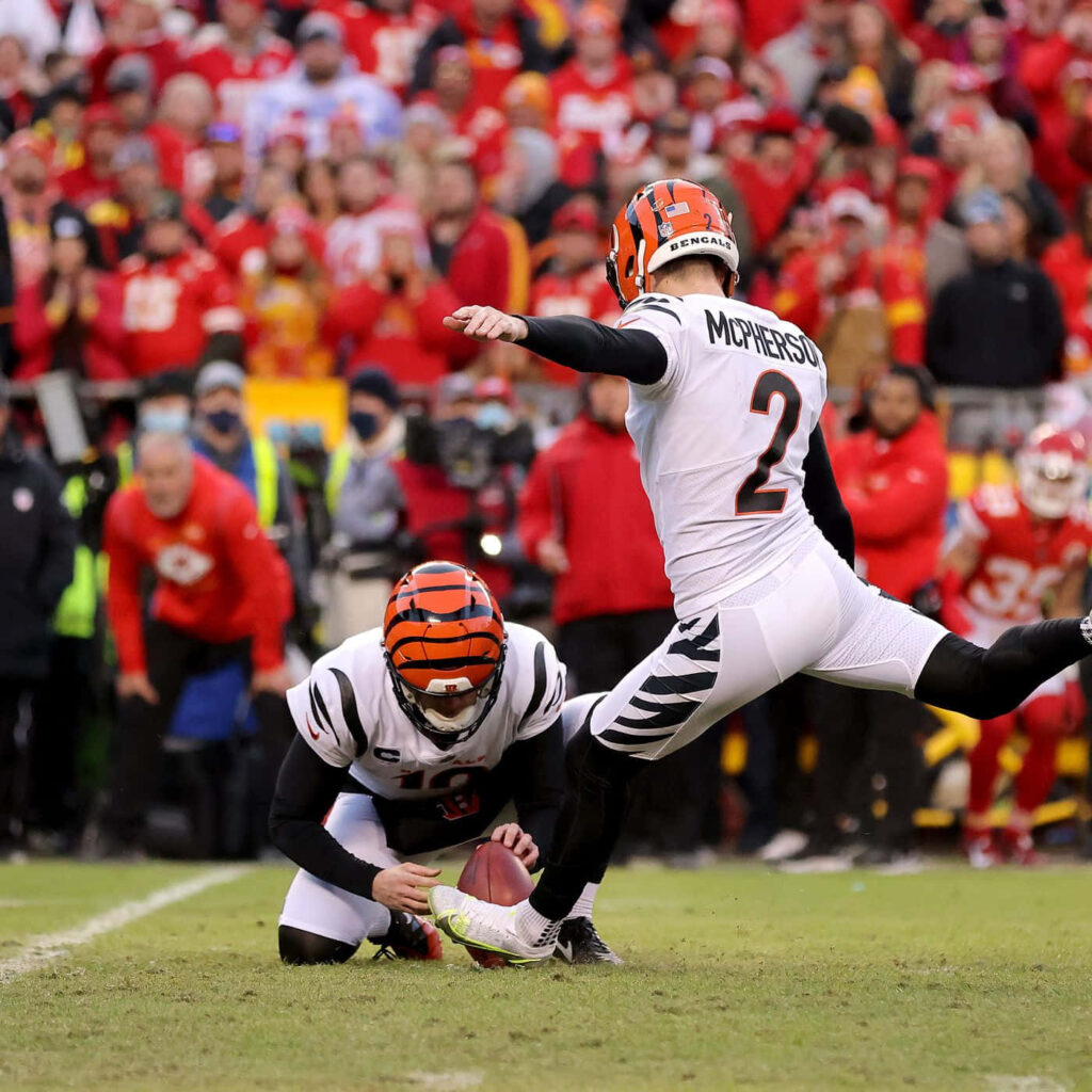Evan McPherson kicking for Cincinnati Bengals in vibrant NFL game stadium background wallpaper