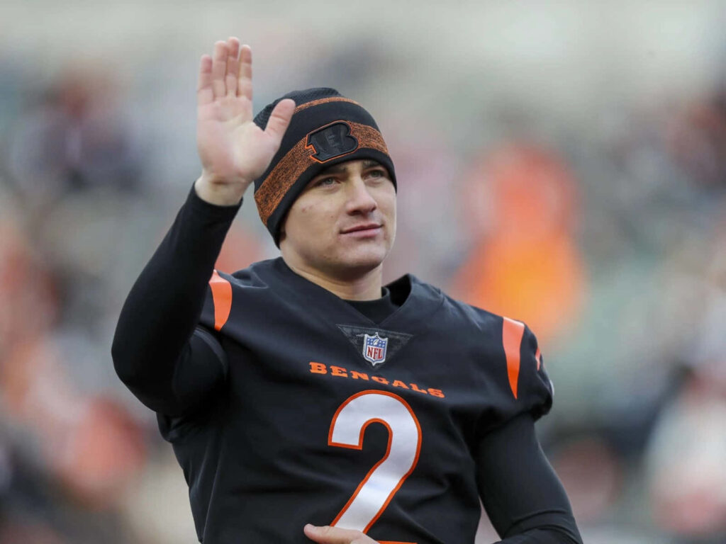 Evan McPherson Cincinnati Bengals kicker in uniform number 2 wearing black beanie stadium background Wallpaper