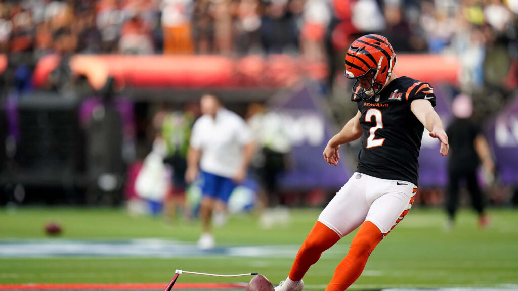 Evan McPherson Cincinnati Bengals kicking field goal intense moment football wallpaper background