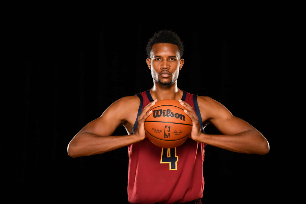Evan Mobley Cleveland Cavaliers basketball player holding Wilson NBA ball studio portrait Wallpaper