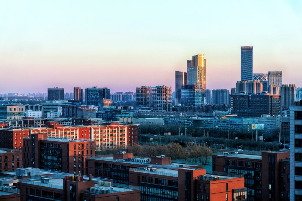 Vibrant Evening Cityscape Wallpaper - Modern Architecture & Sunset Glow