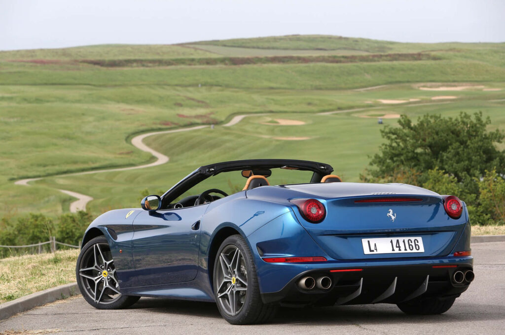 Roaring Elegance: A Captivating Journey with a Ferrari California T through Nature's Majesty Wallpaper