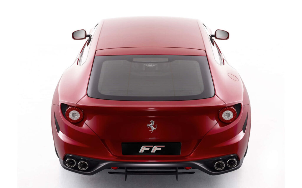 Red Ferrari FF Against a White Background Wallpaper