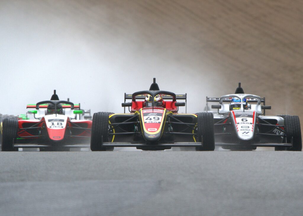Thrilling Formula 1 Wallpaper: Race Cars in Intense Competition